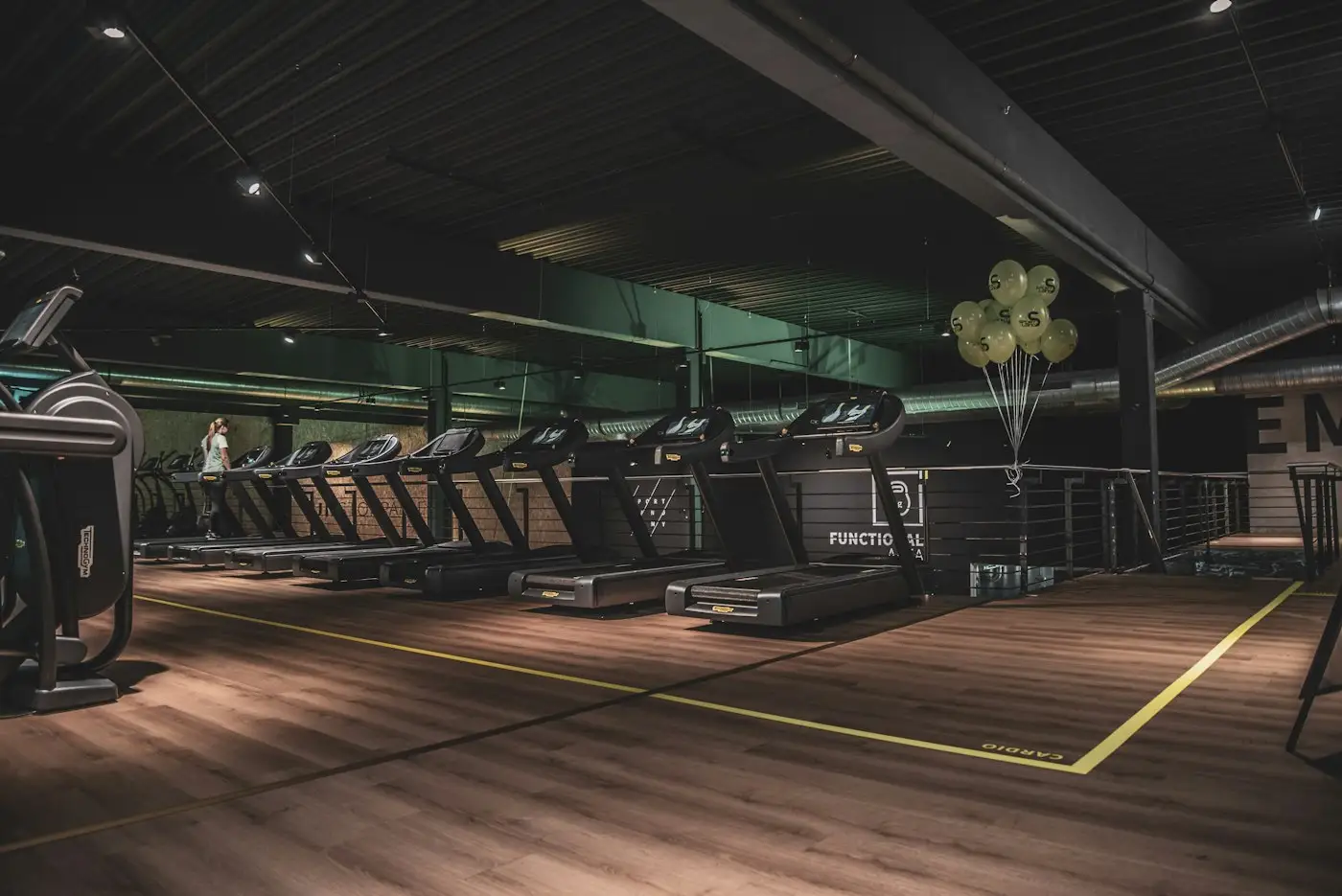 Dark gym floor with training equipment