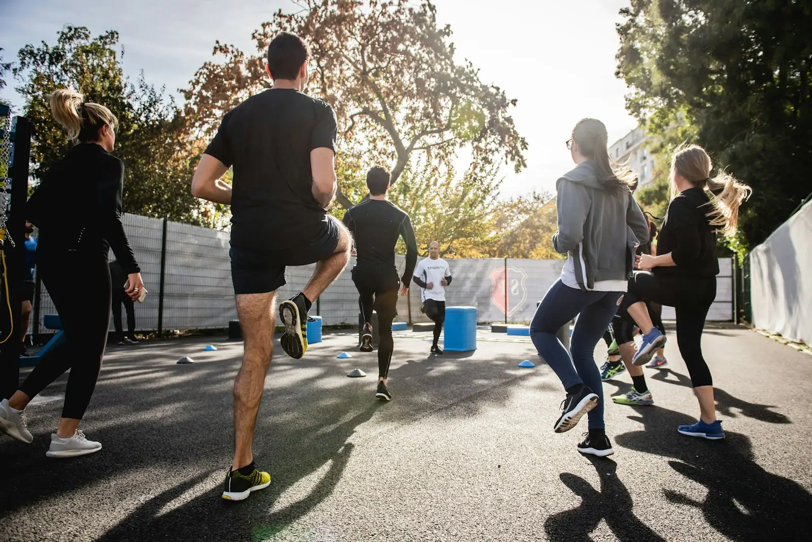 Group of people running outdoors